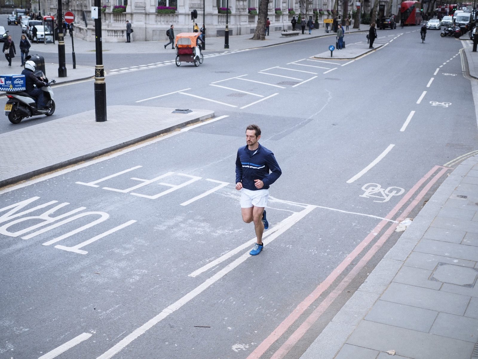 man running streets of london